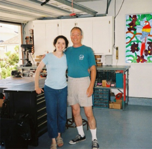 Cindy and John Eddy of The Organizing Team pose for a photo in a garage they had organized.